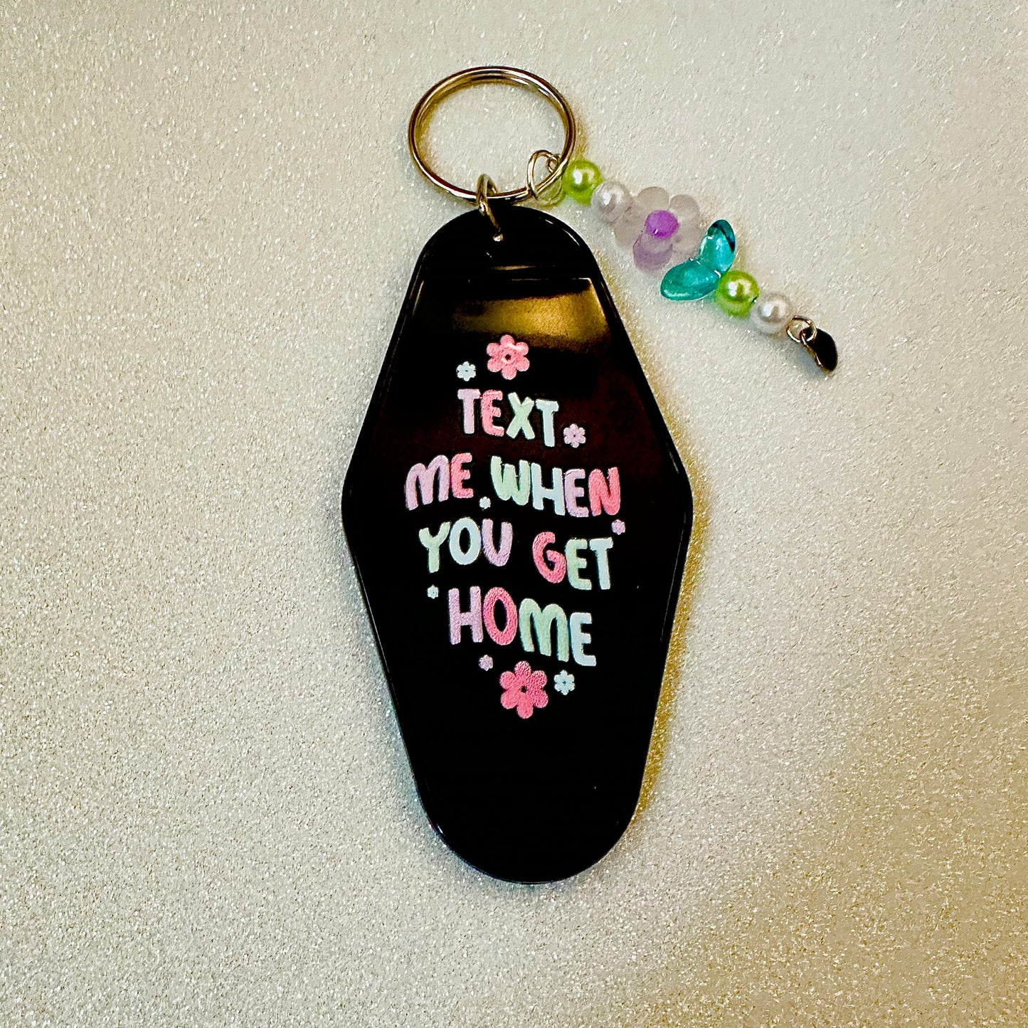 Text Me When Home Motel Keychain